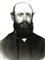 Black and white photo of C. D'Oyley Alpin in a suit and beard