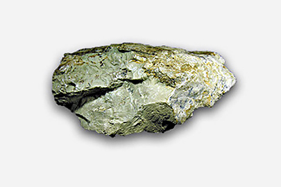 A fragment of talc which is grey-green in colour.